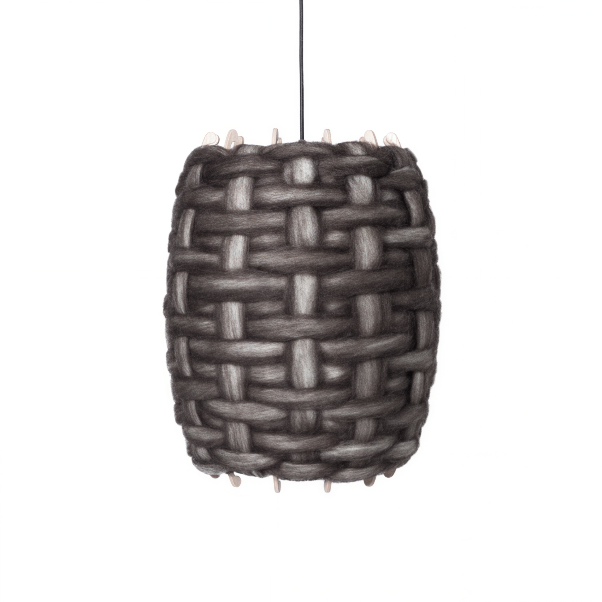 The Rousie Pendant is handcrafted from carded Otago Romney wool and Okoumé marine plywood, finished with a durable water-based polycrylic coating.
