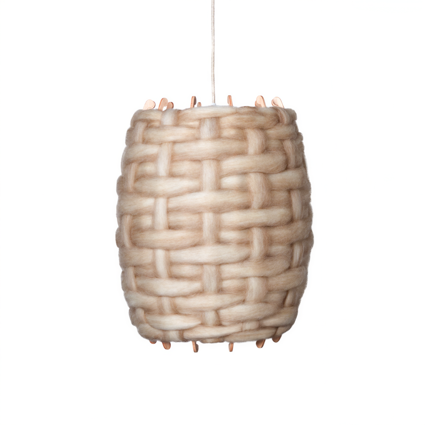 The Rousie Pendant is handcrafted from carded Otago Romney wool and Okoumé marine plywood, finished with a durable water-based polycrylic coating.